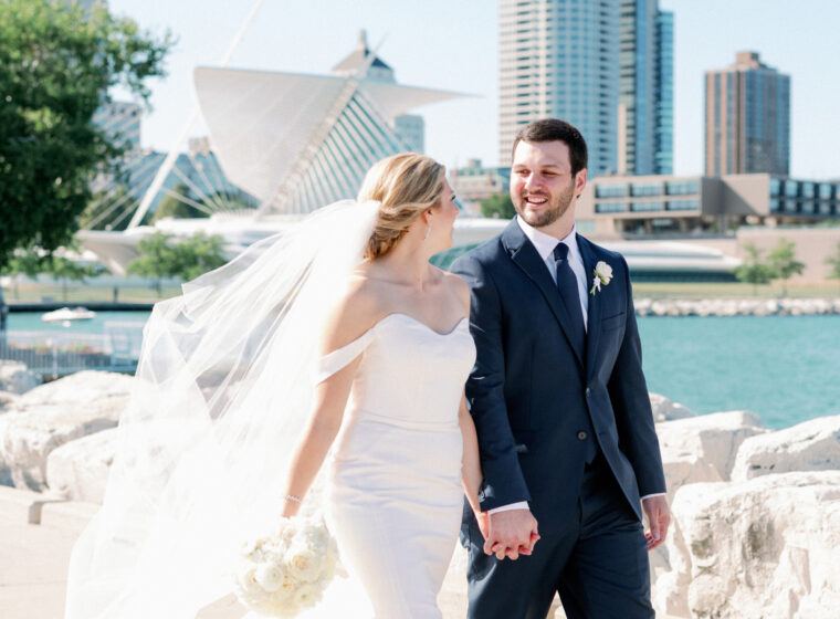 Wedding couple walking lakeside Lake Michigan